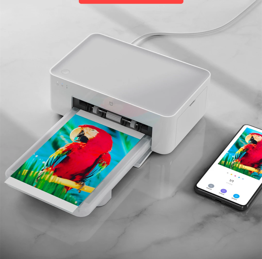Xiaomi представила компактный фотопринтер Xiaomi представила компактный фотопринтер