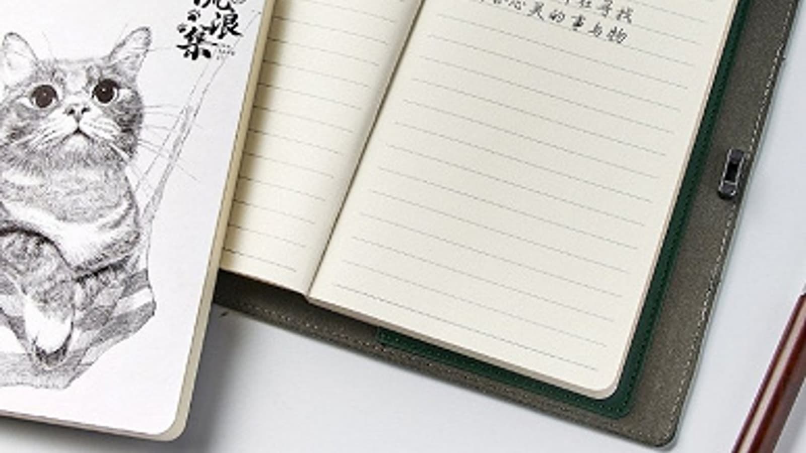 На площадке Xiaomi появился обычный бумажный блокнот в папке со сканером отпечатков пальцев