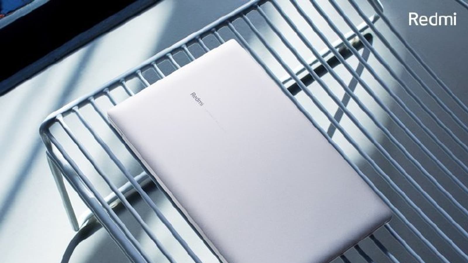 Чрезвычайно компактный RedmiBook 13 показан снаружи и изнутри