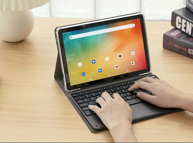 10 дюймов, тонкий металлический корпус, две SIM-карты, стереодинамики, недорого. Первый планшет Doogee предлагается за 0 в Китае