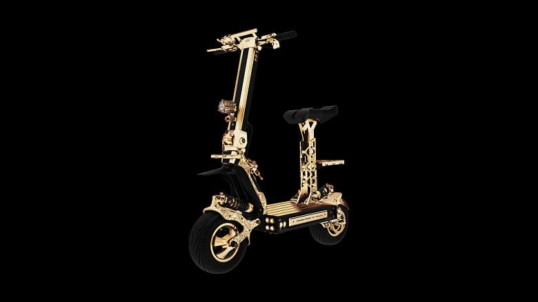 При заказе этого электросамоката вы получите iPhone 14 в подарок. Золотой Thunderball разгоняется до 100 км/час